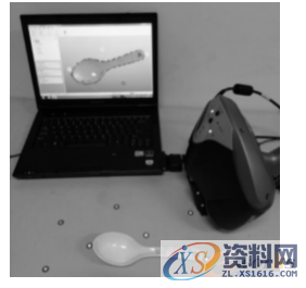 UG塑胶模具设计：逆向工程与快速原型的三维模型重构,图2 用手持式激光扫描仪扫描汤匙表面,三维,模具设计,第3张